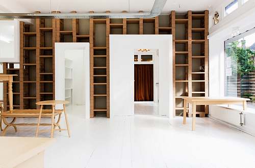 interior design two beige wooden tables in white room furniture